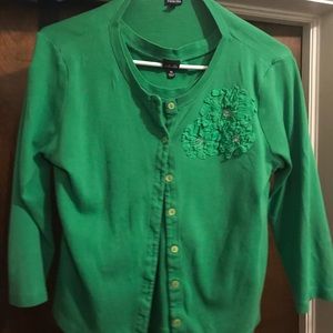 Green sweater jacket with matching shirt